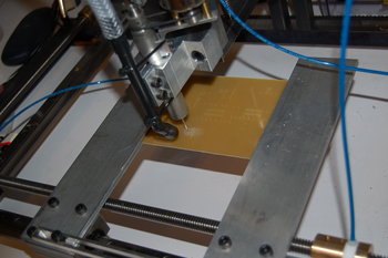 FabBSD driving a PCB drilling machine